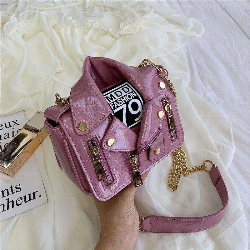 "Stylish T-BOO PU Leather Motorcycle Shoulder Bag with Chain Accent and Rivet Detailing"